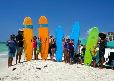 Posing with surf boards at RideOn Surf School
